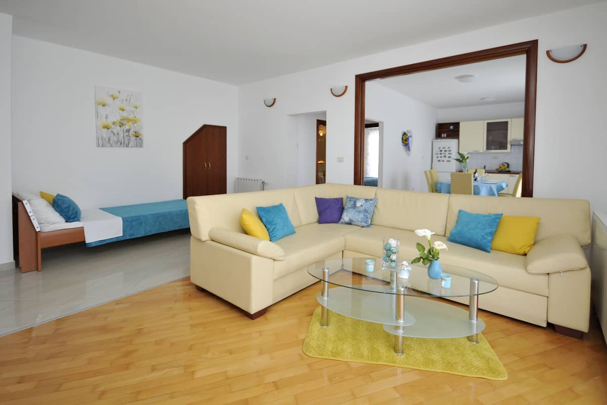 Family Apartment, 1 Bedroom, Sea View, Sea Facing | Living area | TV