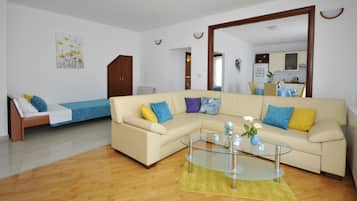 Family Apartment, 1 Bedroom, Sea View, Sea Facing | Living area | TV