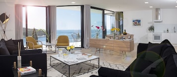 Elite Three Bedroom Apartment with spectacular Sea View and Balcony | Living area | Flat-screen TV