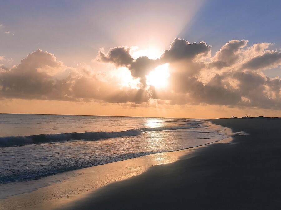 On the beach, white sand, free beach cabanas, beach shuttle