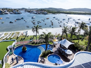 2 outdoor pools, pool umbrellas, pool loungers