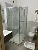 Shower, free toiletries, hair dryer, bidet