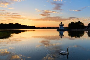Guests can enjoy serene lakeside views and a glimpse of historic architecture.