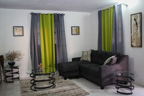 Suite, 2 Bedrooms | Living area | Flat-screen TV