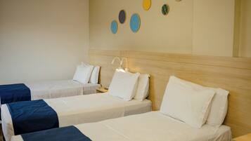 Comfort Triple Room, 3 Twin Beds | Hypo-allergenic bedding, minibar, desk, blackout drapes