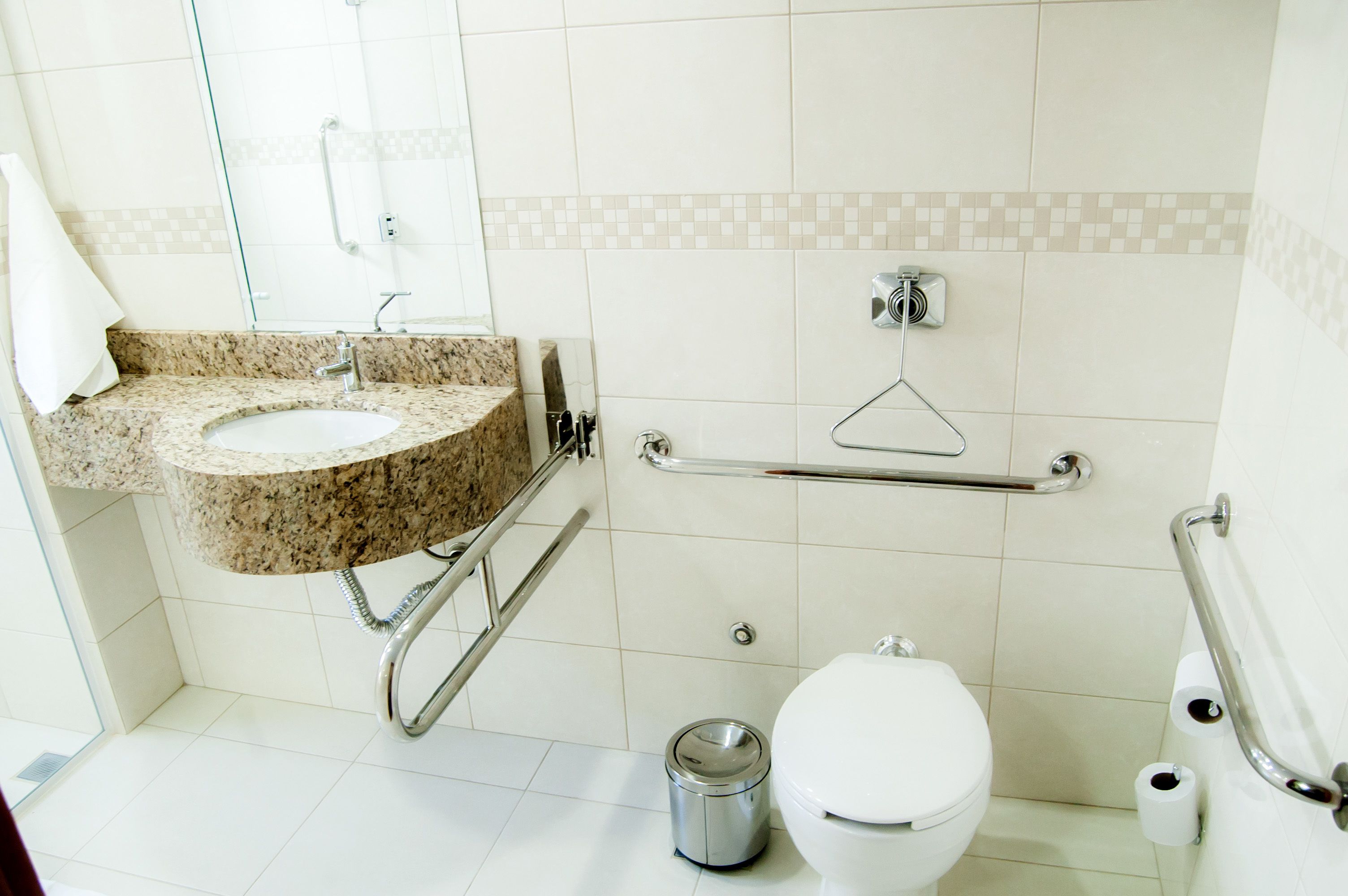 twin room, accessible (double room pcd) | bathroom | shower, free toiletries, hair dryer, towels