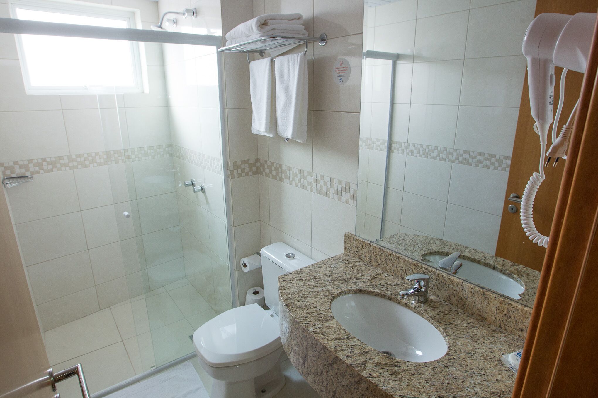 shower, free toiletries, hair dryer, towels