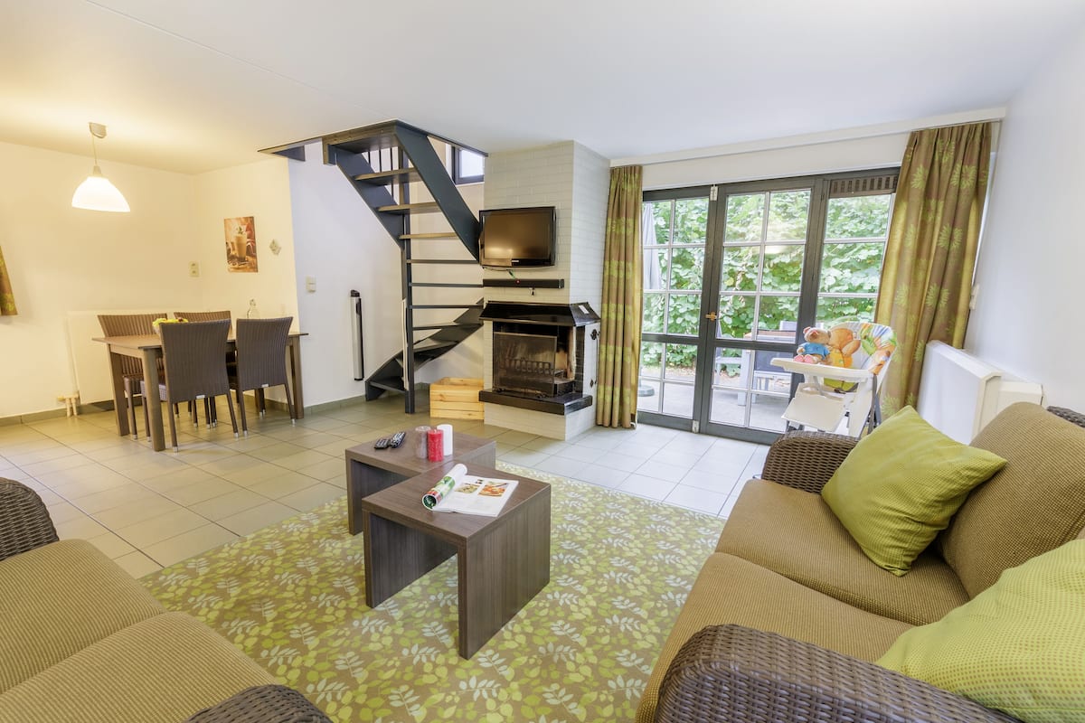 Exclusieve cottage (Exclusive 4) | Woonruimte | Een televisie