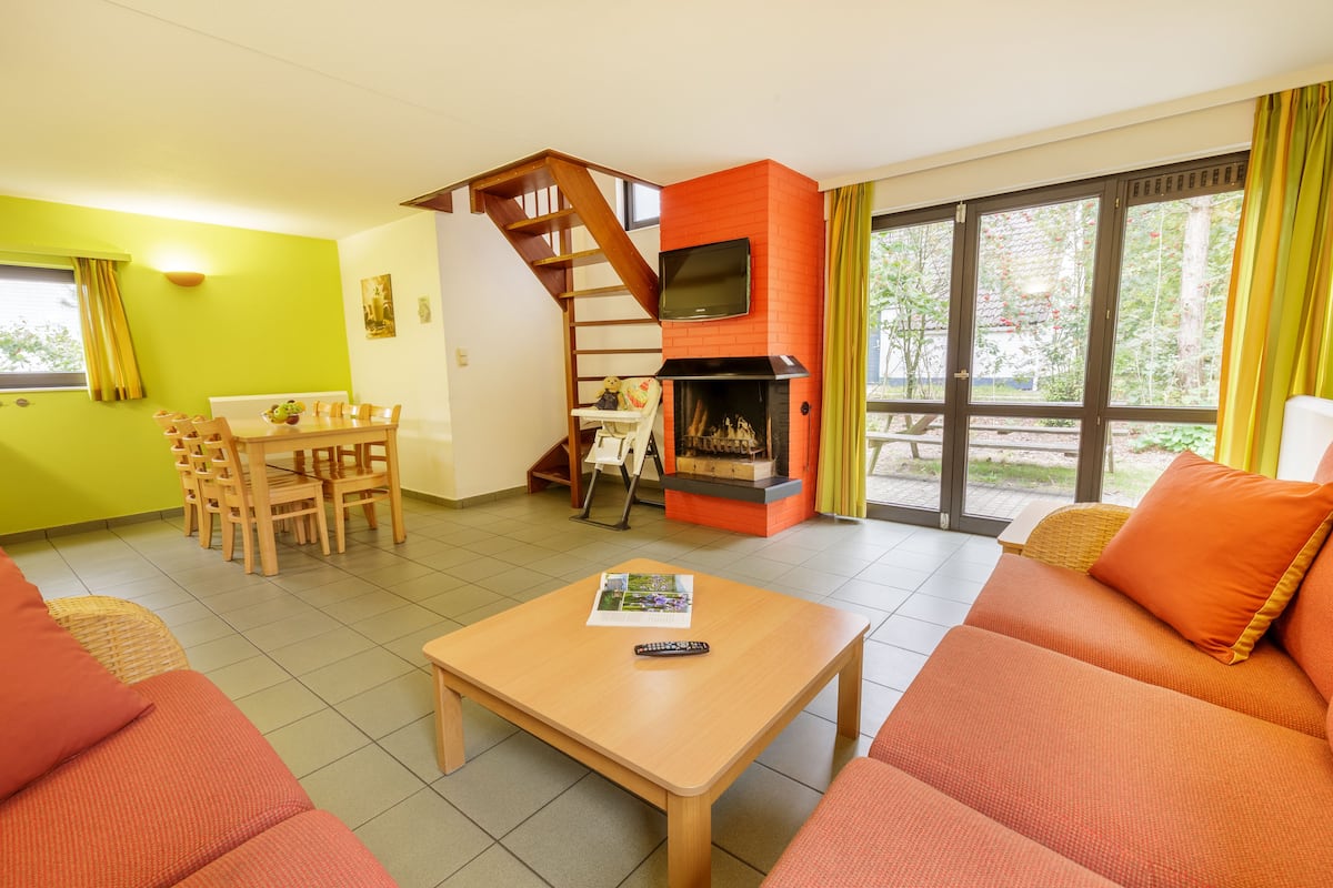 Comfort cottage (Select 6) | Woonruimte | Een televisie