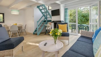Cottage Confort | Salle de séjour | Télévision de 80 cm avec chaßnes par cùble