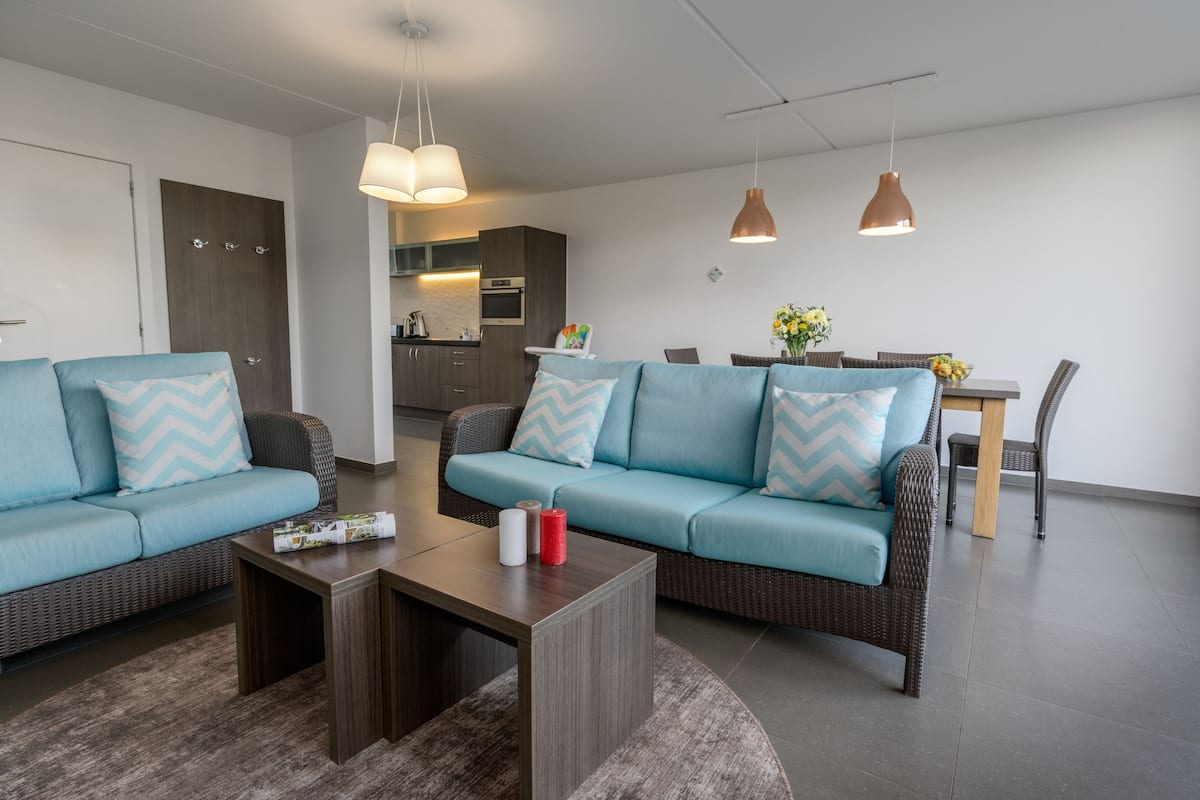 Deluxe Cottage | Living room | 80-cm TV with cable channels