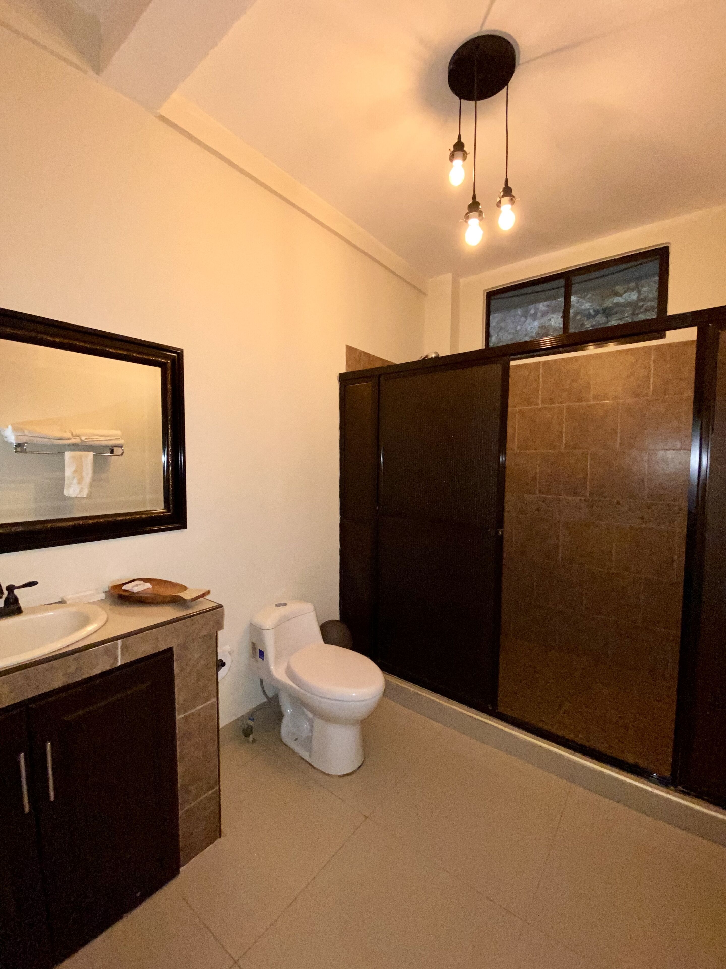 green room | bathroom | shower, free toiletries, hair dryer, towels