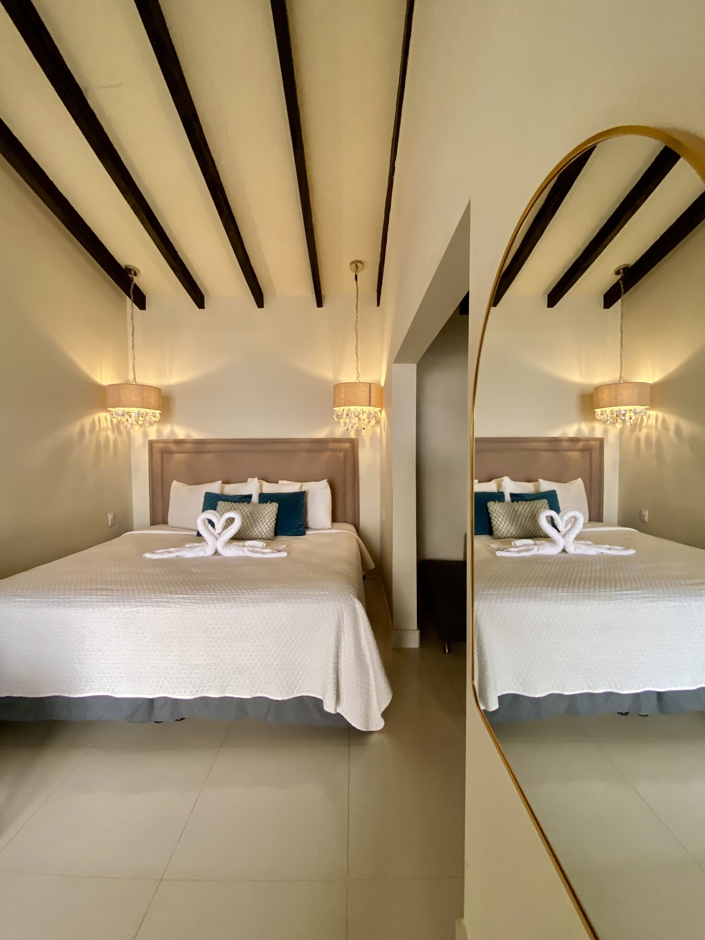 honeymoon room, 1 king bed, hot tub, ocean view | in-room safe, desk, iron/ironing board, free wifi