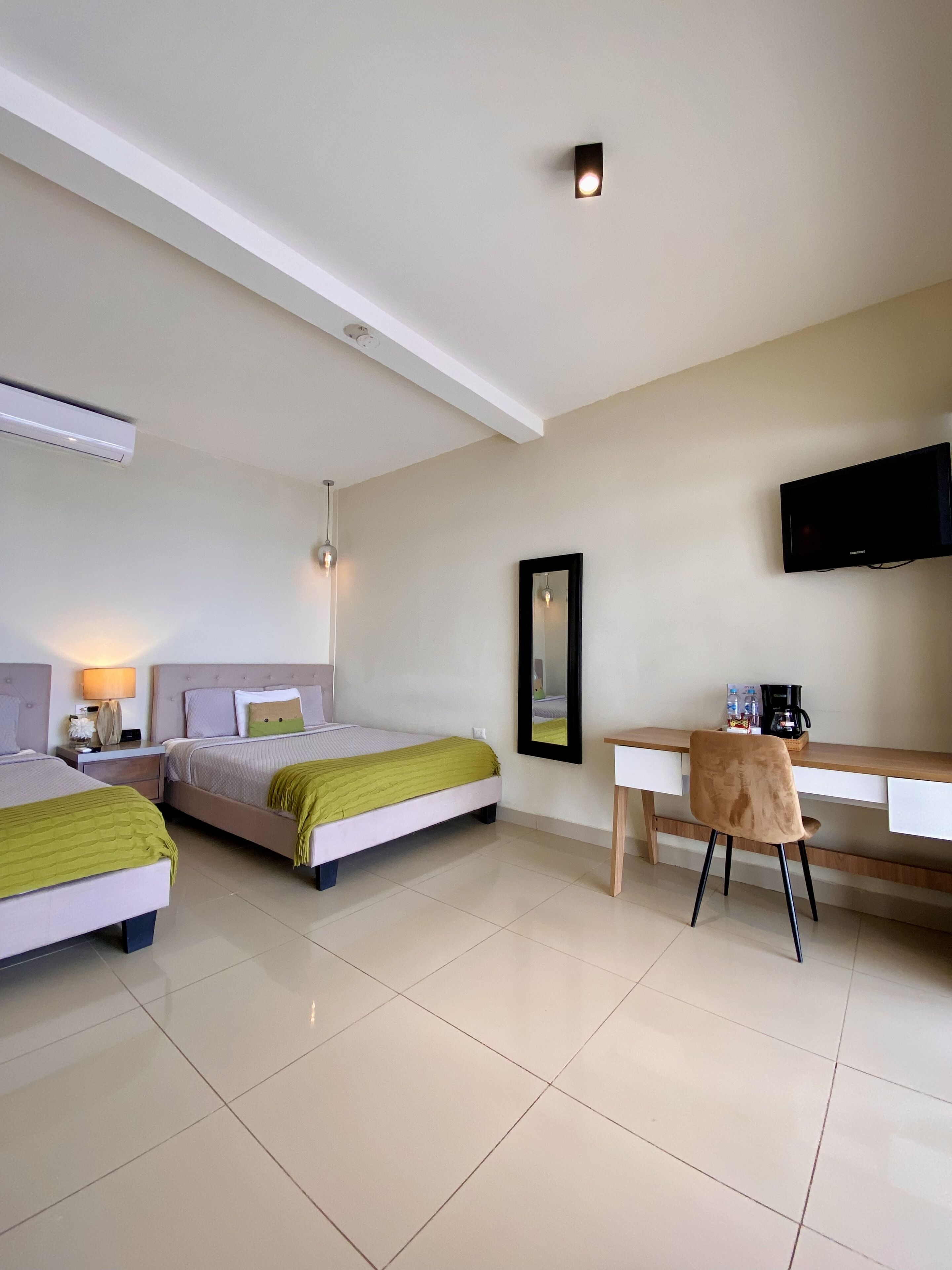 green room | in-room safe, desk, iron/ironing board, free wifi