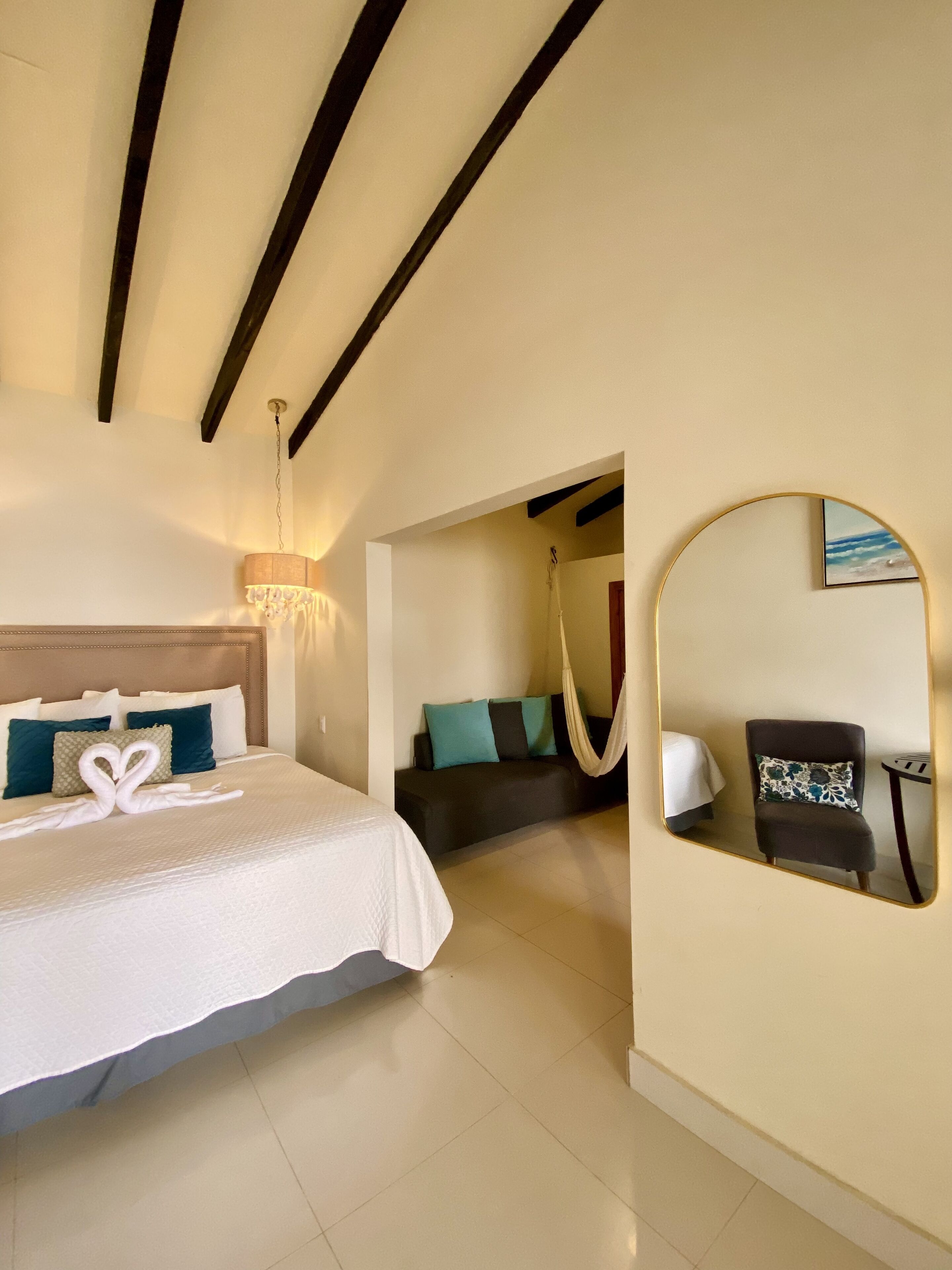 honeymoon room, 1 king bed, hot tub, ocean view | in-room safe, desk, iron/ironing board, free wifi