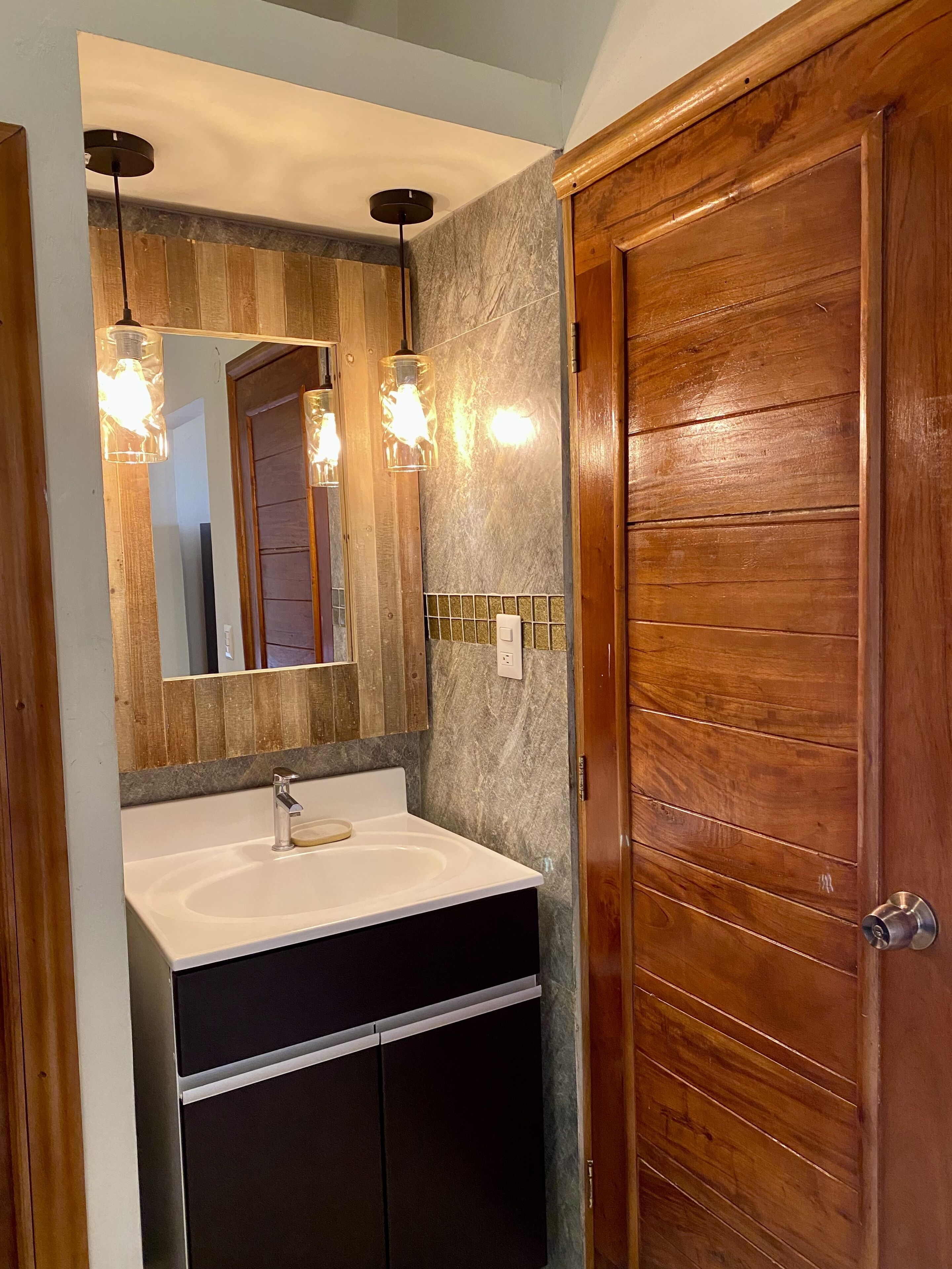 honeymoon room, 1 king bed, hot tub, ocean view | bathroom | shower, free toiletries, hair dryer, towels