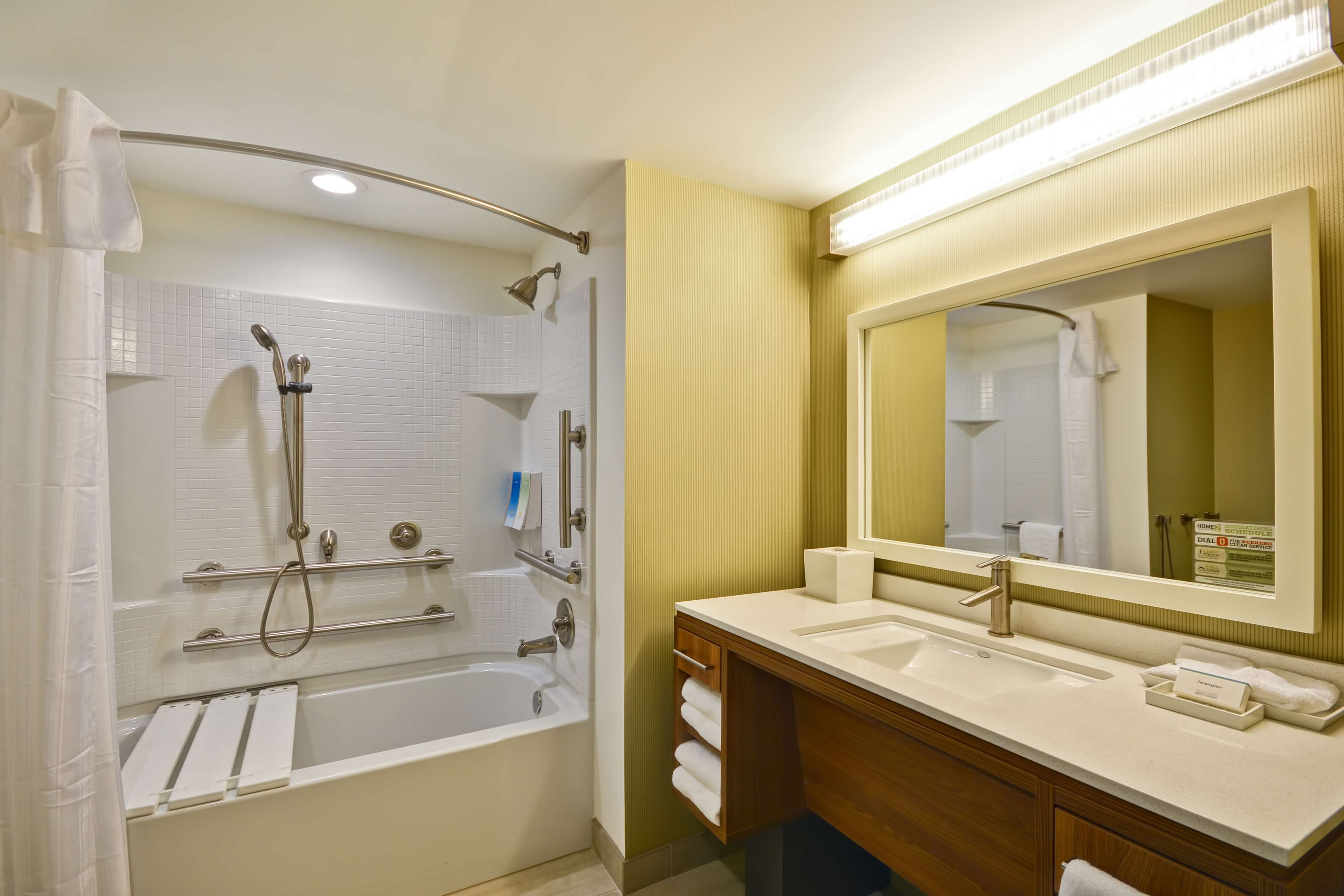 suite, 1 king bed, accessible, bathtub | bathroom | combined shower/bathtub, free toiletries, hair dryer, towels