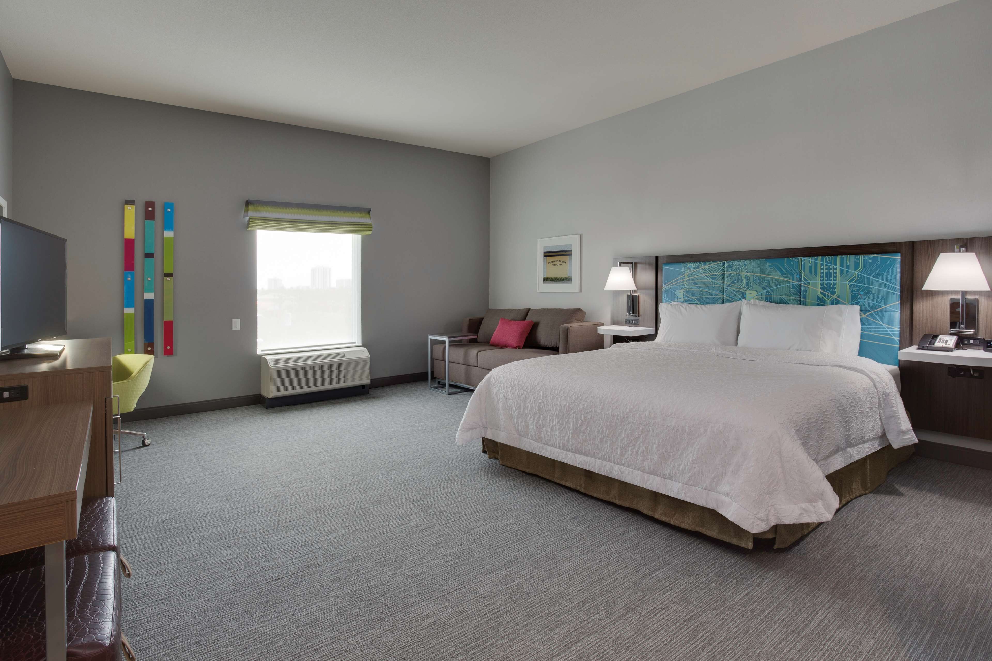 room, 1 king bed with sofa bed, accessible, bathtub | 1 bedroom, in-room safe, desk, iron/ironing board