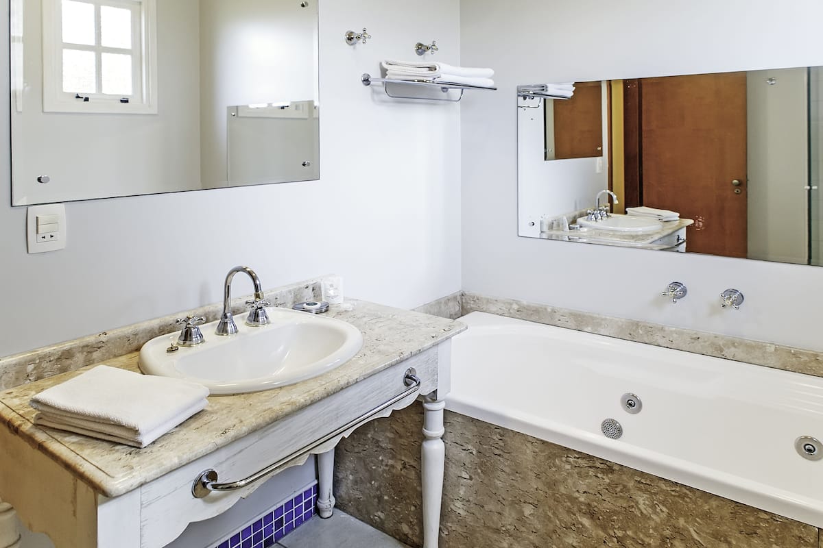 luxury suite, 1 king bed, accessible | jetted bathtub