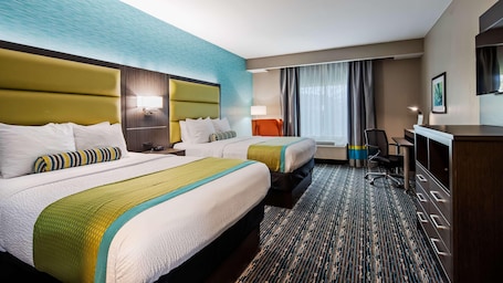 Pillowtop beds, desk, iron/ironing board, free cribs/infant beds