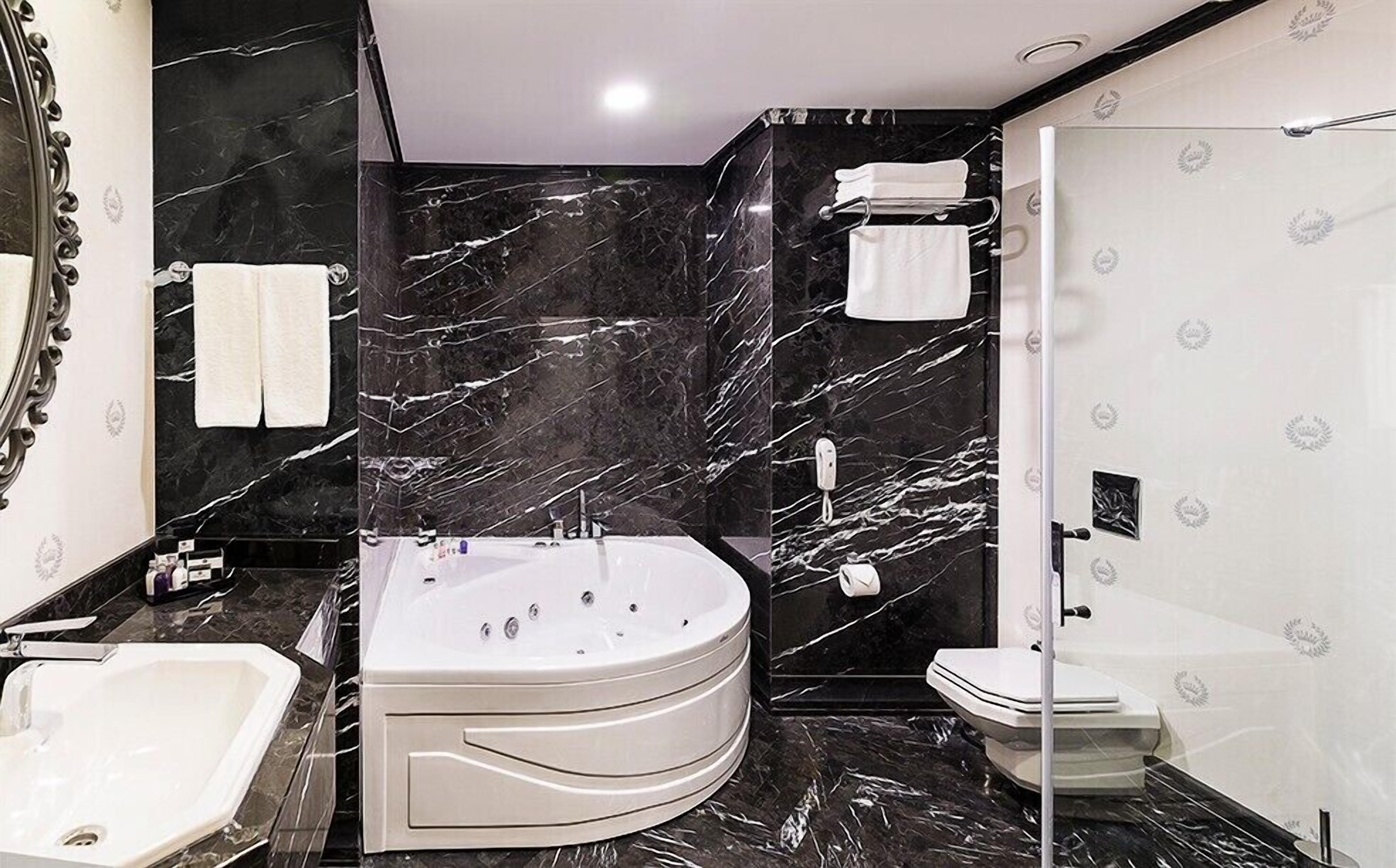 combined shower/bathtub, free toiletries, hair dryer, bathrobes