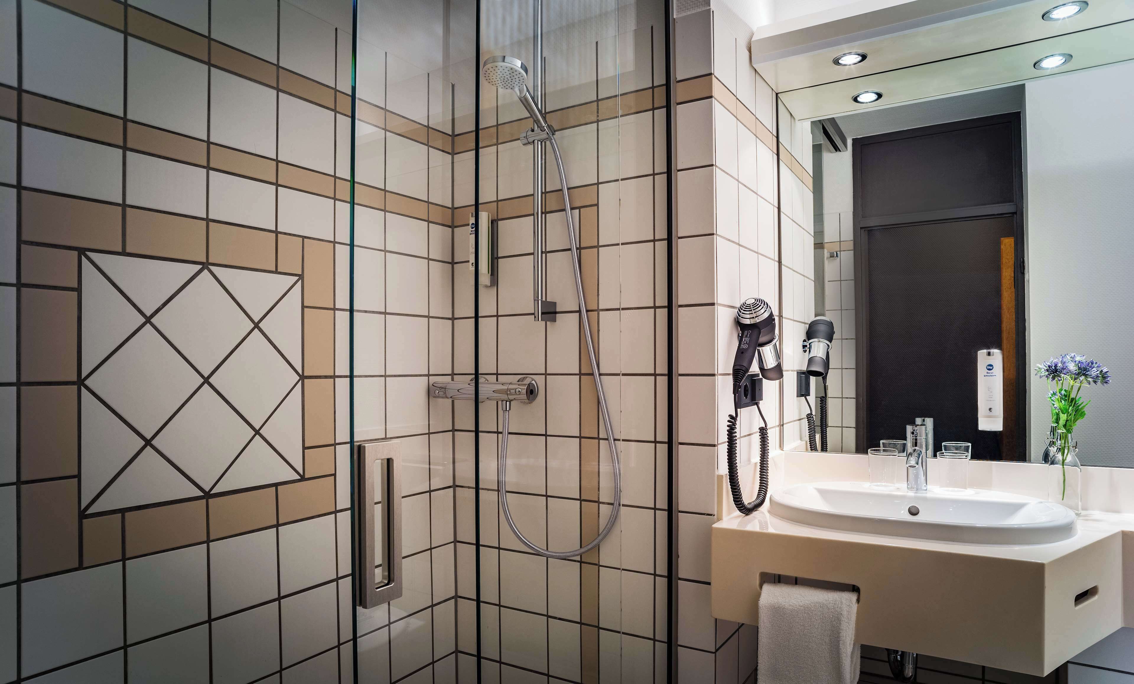 hair dryer, towels, soap, shampoo