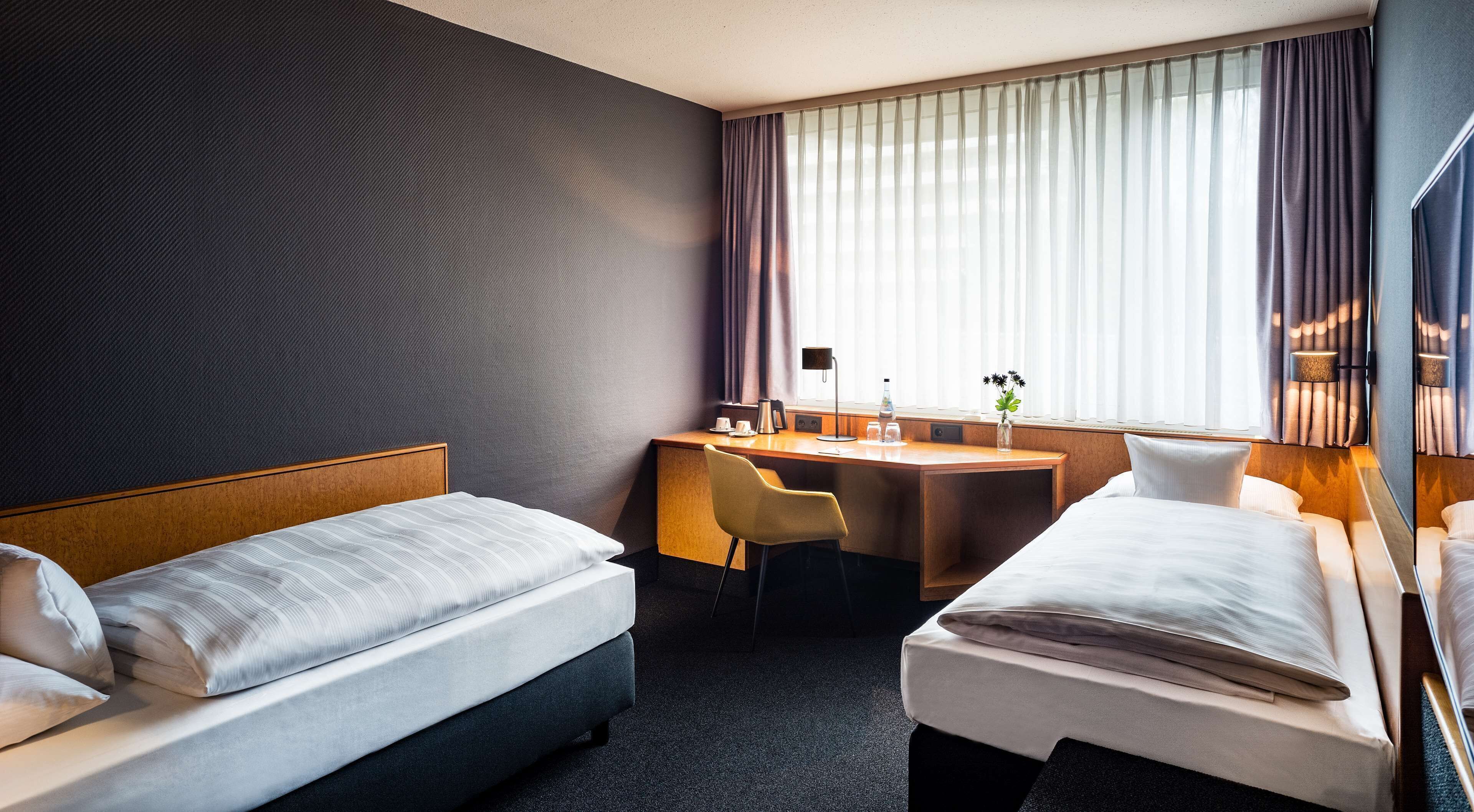 Hochwertige Bettwaren, Verdunkelungsvorhänge, schallisolierte Zimmer