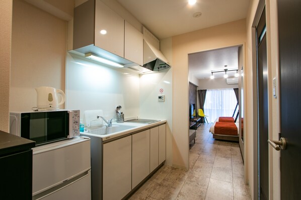 Appartement supérieur (Fourth) | Cuisinette privée | Réfrigérateur, four à micro-ondes, bouilloire électrique