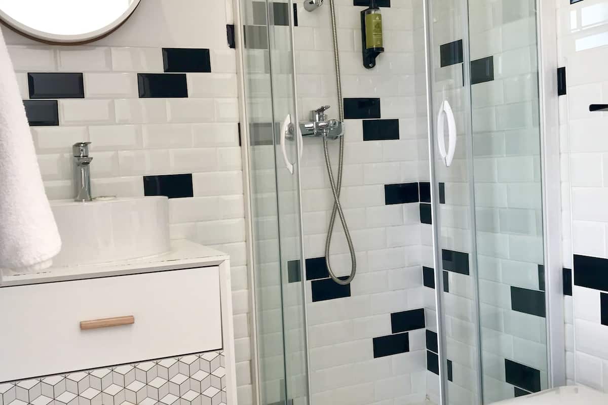 shower, eco-friendly toiletries, hair dryer, towels