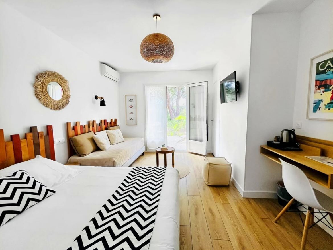 Comfort Triple Room, Terrace, Garden Area (CONFORT TERRASSE 3 pers) | Individually decorated, individually furnished, free WiFi, bed sheets