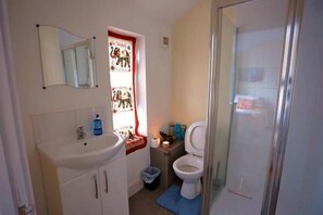 Basic Single Room, Kitchenette (Namaste Room) | Bathroom | Shower, free toiletries, hair dryer