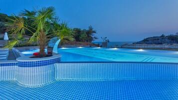 Outdoor pool, pool umbrellas, pool loungers