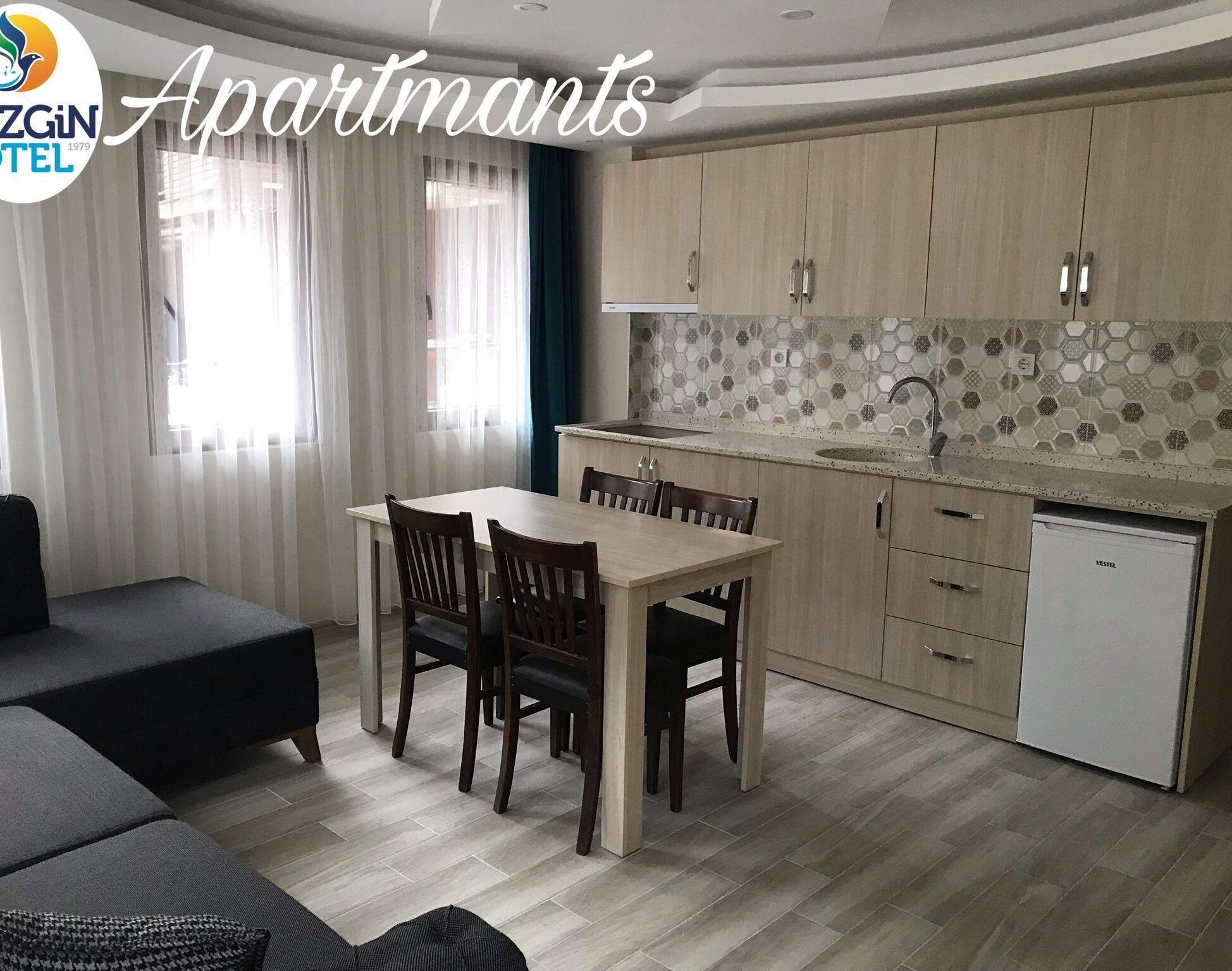 Family Condo | Private kitchen | Stovetop, cleaning supplies, freezer