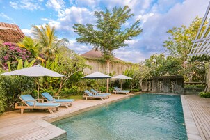 Outdoor pool, pool umbrellas, sun loungers