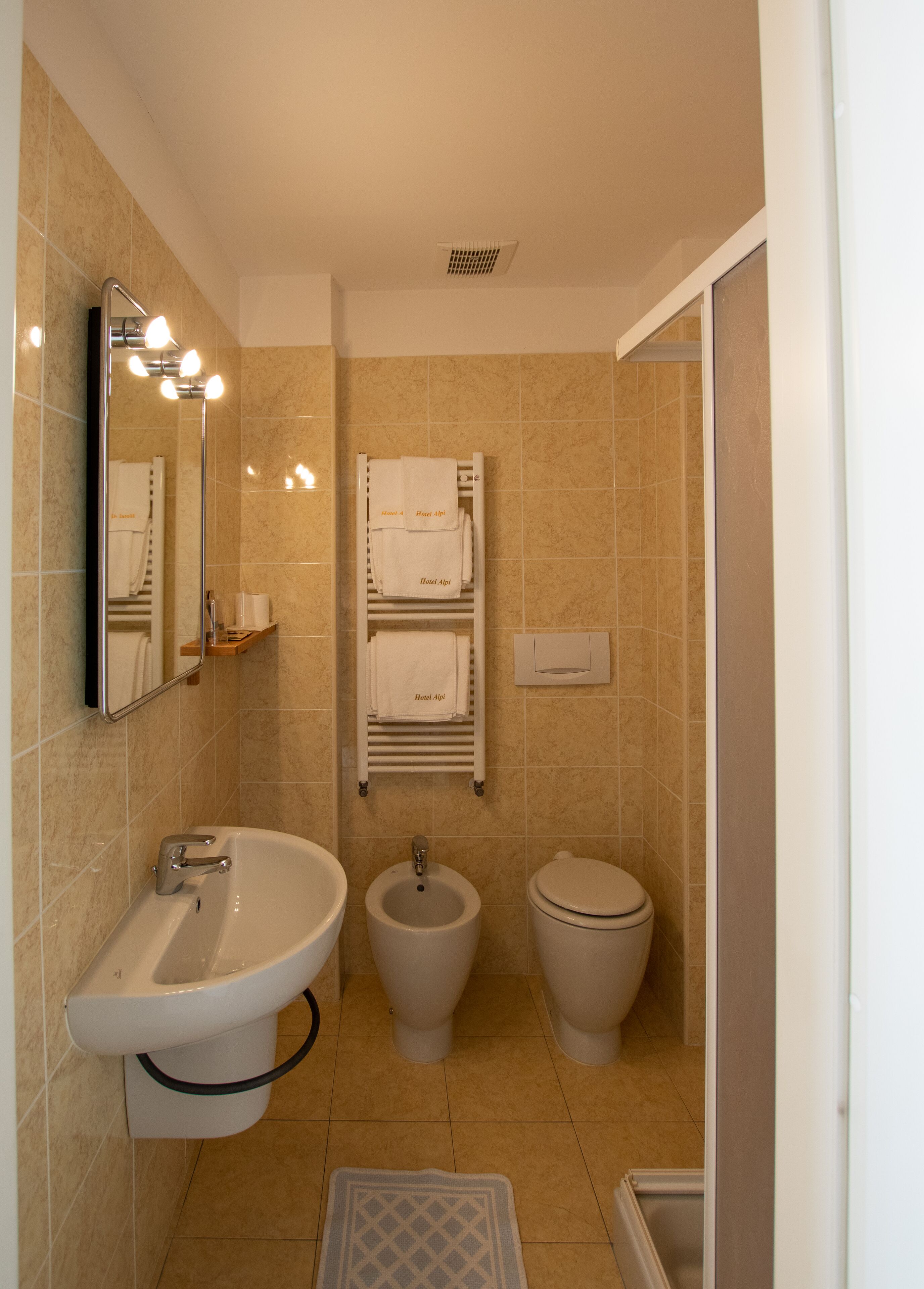 slippers, bidet, towels