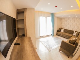 One Bedroom Suite With Sofa Bed and Balcony  | Premium bedding, free minibar items, in-room safe