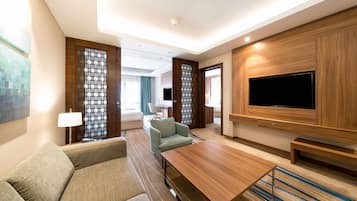 Suite, 2 Bedrooms | Living area | TV