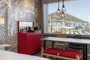 Minibar, in-room safe, desk, laptop workspace - Radisson RED V&A Waterfront, Cape Town (Cape Town)