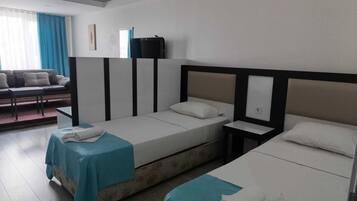 Family Quadruple Room | Minibar, desk, free WiFi