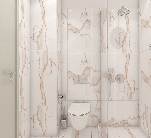 Un baño moderno con baldosas de mármol, un inodoro, una ducha con cabezal de ducha manual y un perchero.