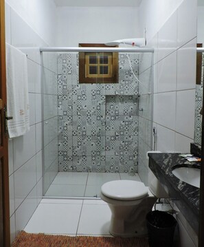 Shower, hair dryer, towels