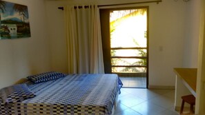 Premium Suite, 1 Bedroom, Garden View | Desk, laptop workspace, iron/ironing board, free WiFi - Residencial Caminho do Sol Chalés (São Sebastião)