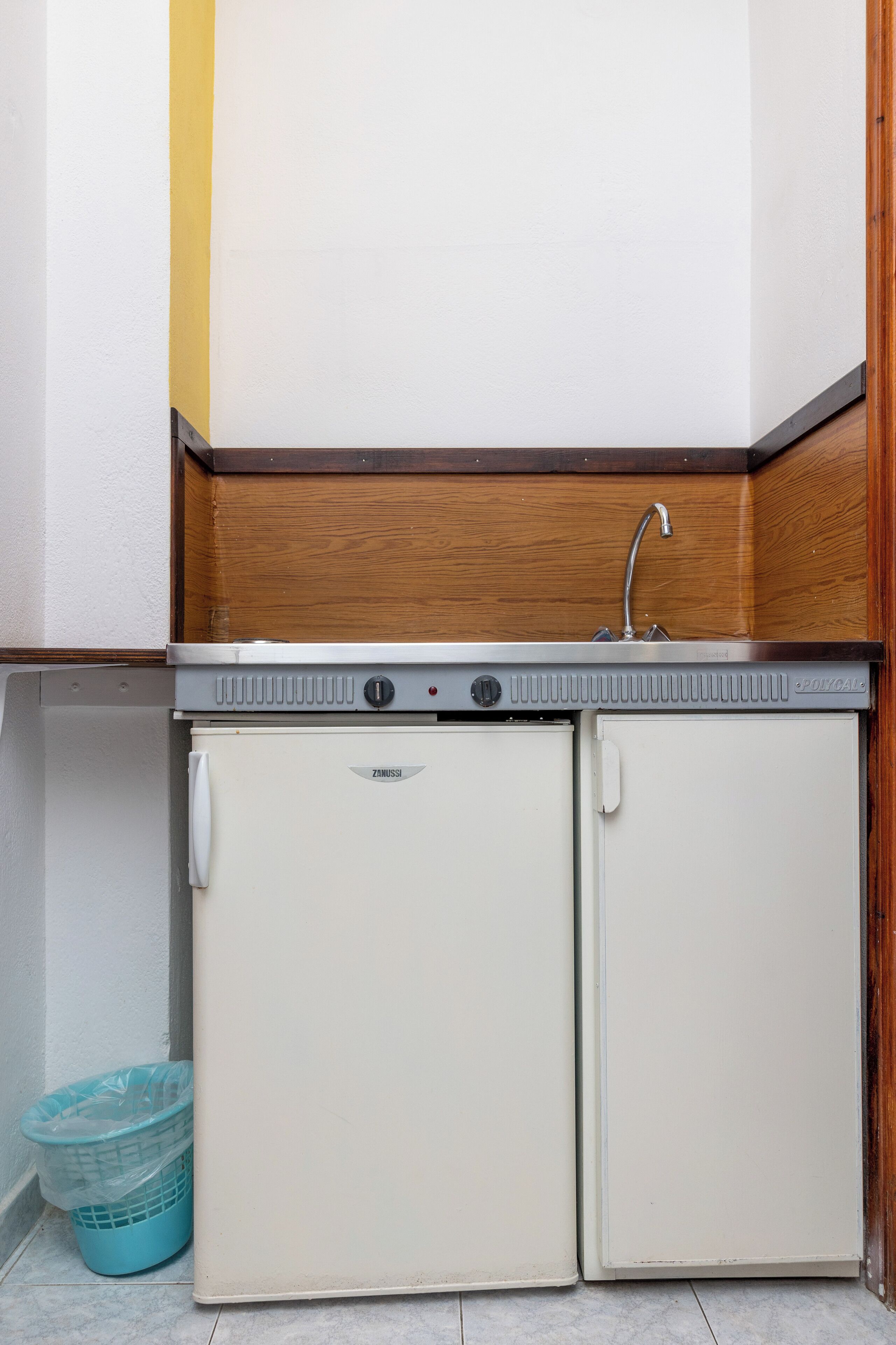 Mini-fridge, stovetop, high chair, cookware/dishes/utensils