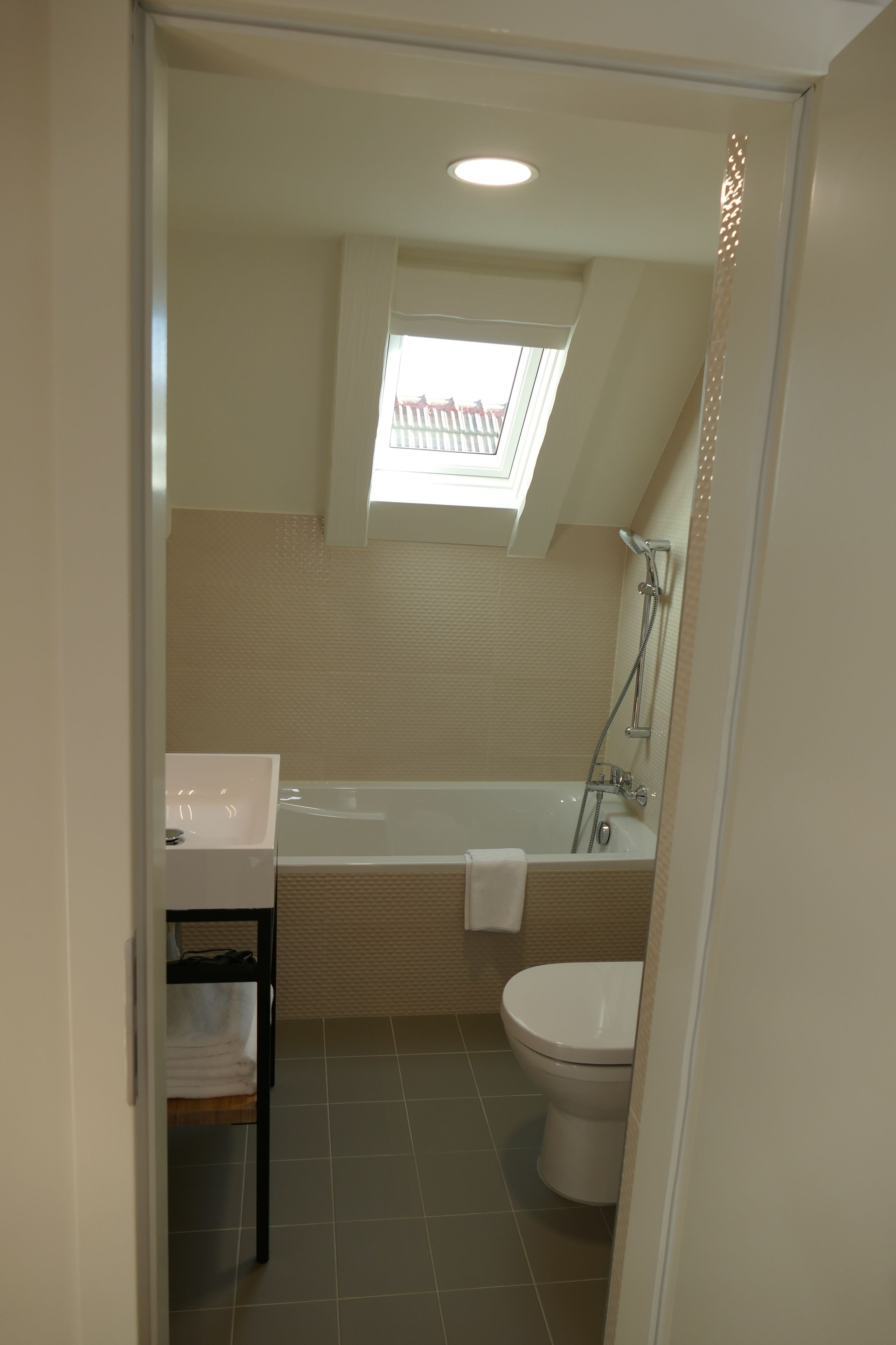 superior suite | bathroom | rainfall showerhead, free toiletries, hair dryer, towels