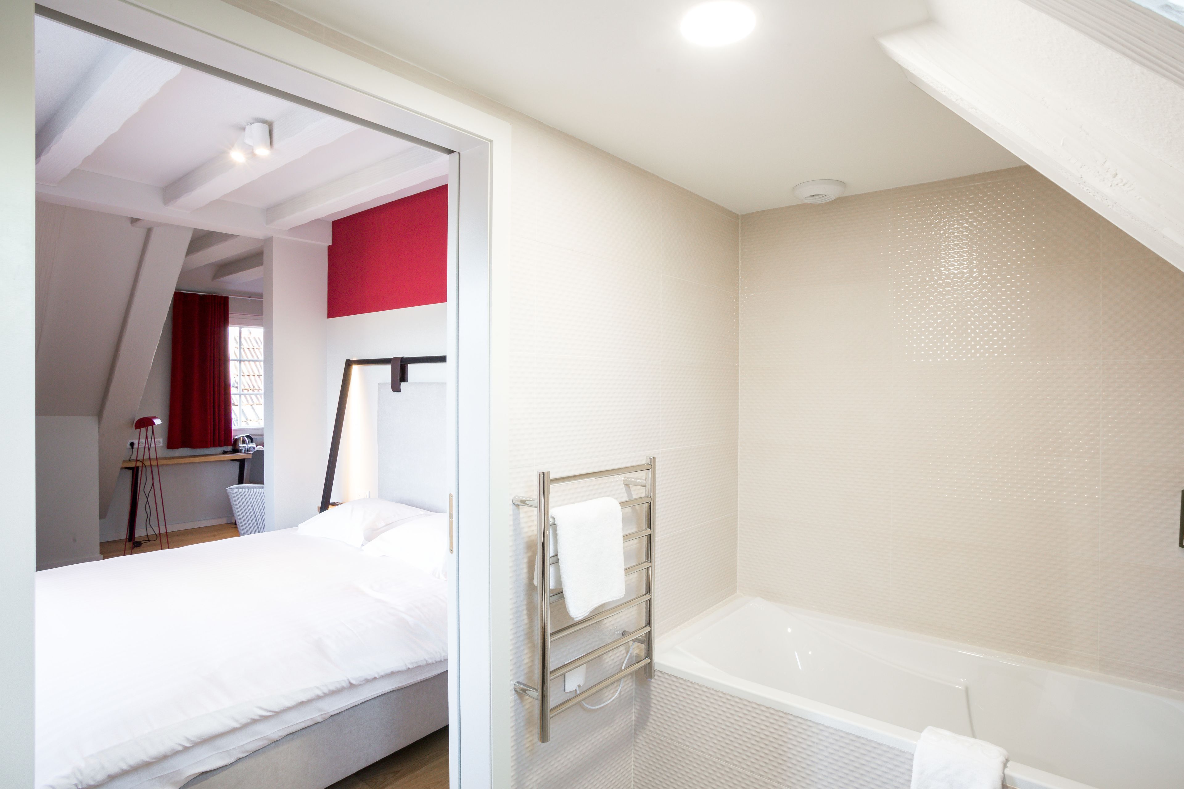 superior suite | bathroom | rainfall showerhead, free toiletries, hair dryer, towels