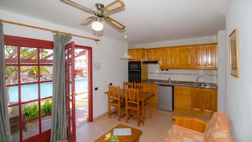 Fridge, microwave, stovetop, cookware/dishes/utensils