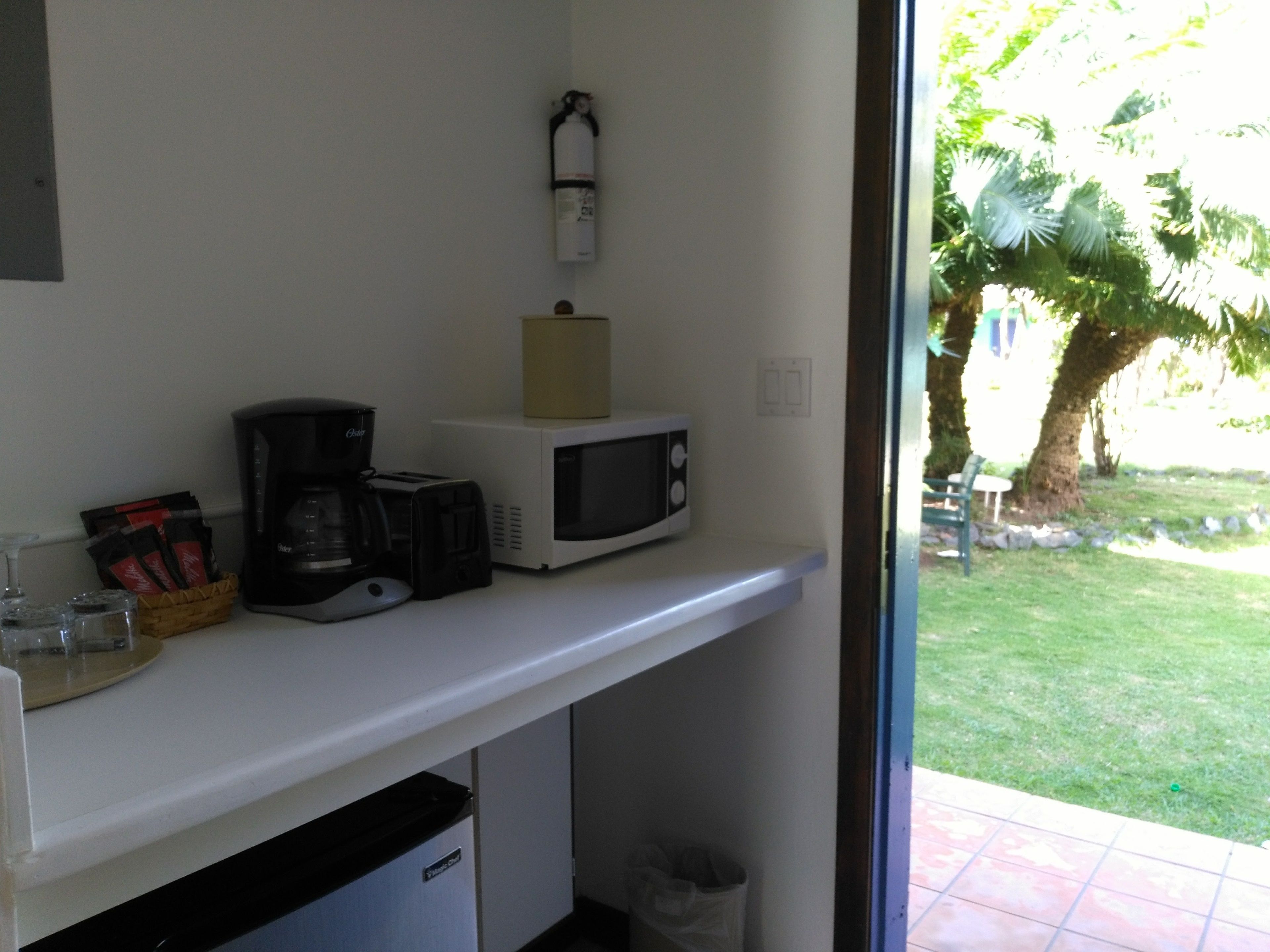 Fridge, microwave, stovetop, coffee/tea maker