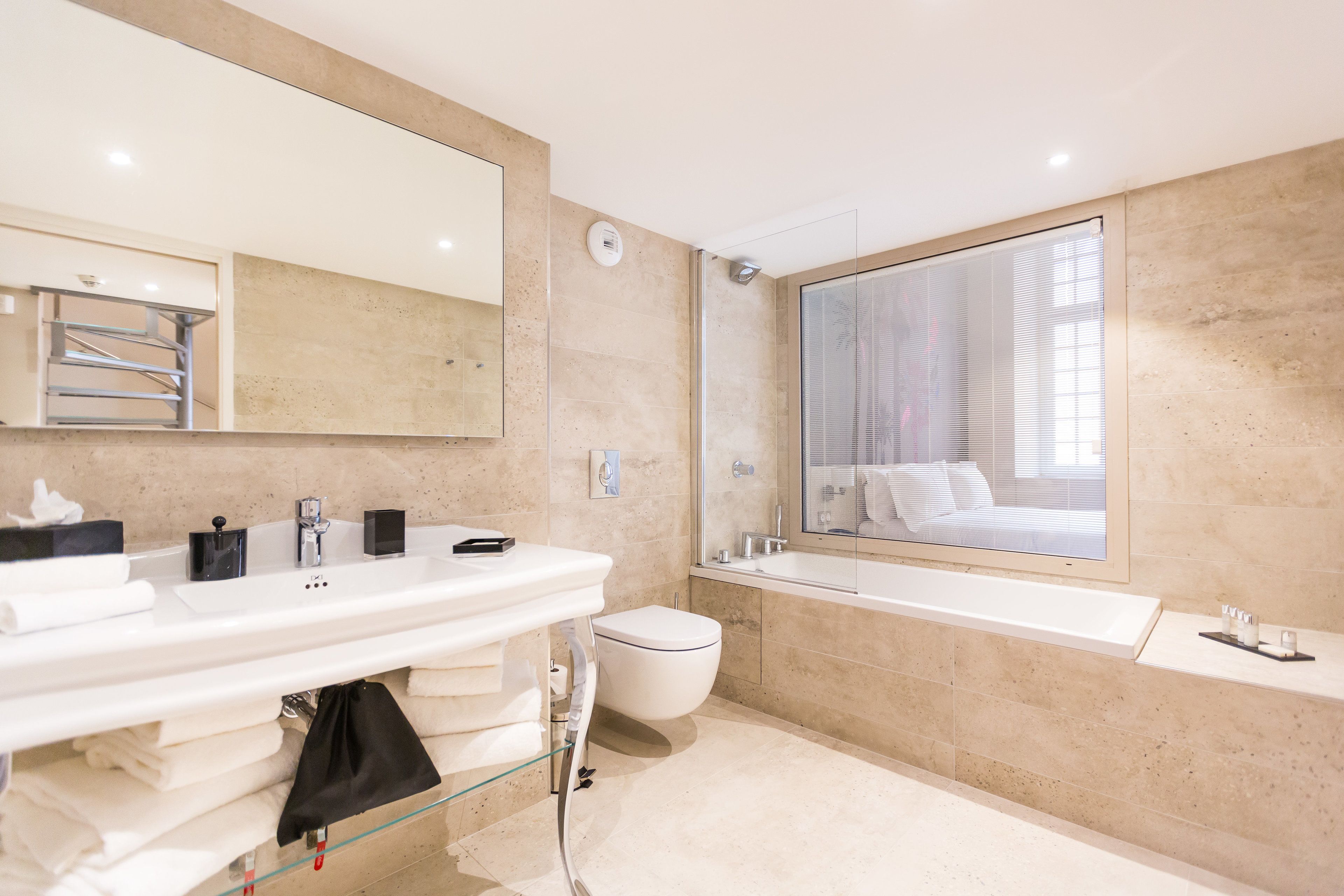 free toiletries, hair dryer, slippers, towels