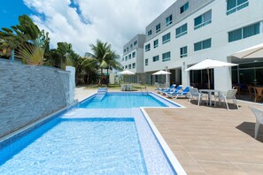 2 outdoor pools, open 9:00 AM to 9:00 PM, pool umbrellas, sun loungers