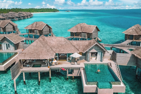 One Bedroom Over Water Pool Residence | Egyptian cotton sheets, premium bedding, free minibar items